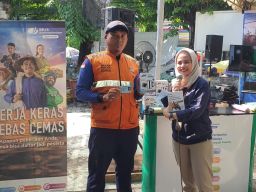 BPJAMSOSTEK Kampanyekan Kerja Keras Bebas Cemas di Pasar Baru Gresik