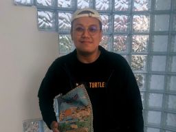 Ade Candra: Dari Keterbatasan Fisik Menuju Lensa Profesional