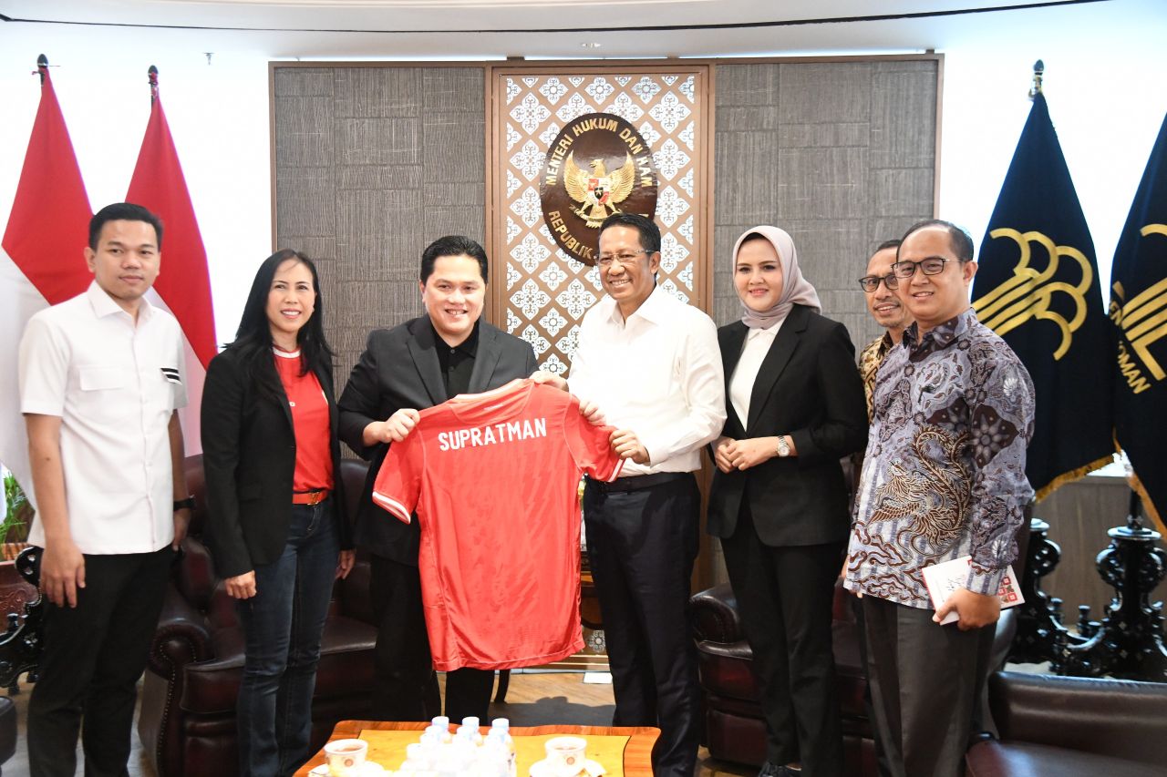 Menkumham saat bertemu Erick Thohir