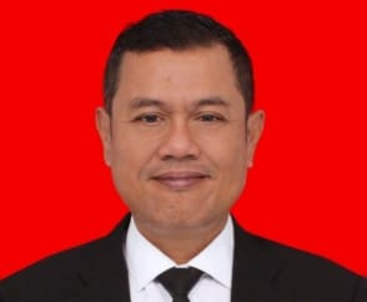 Charles M. Tampubolon